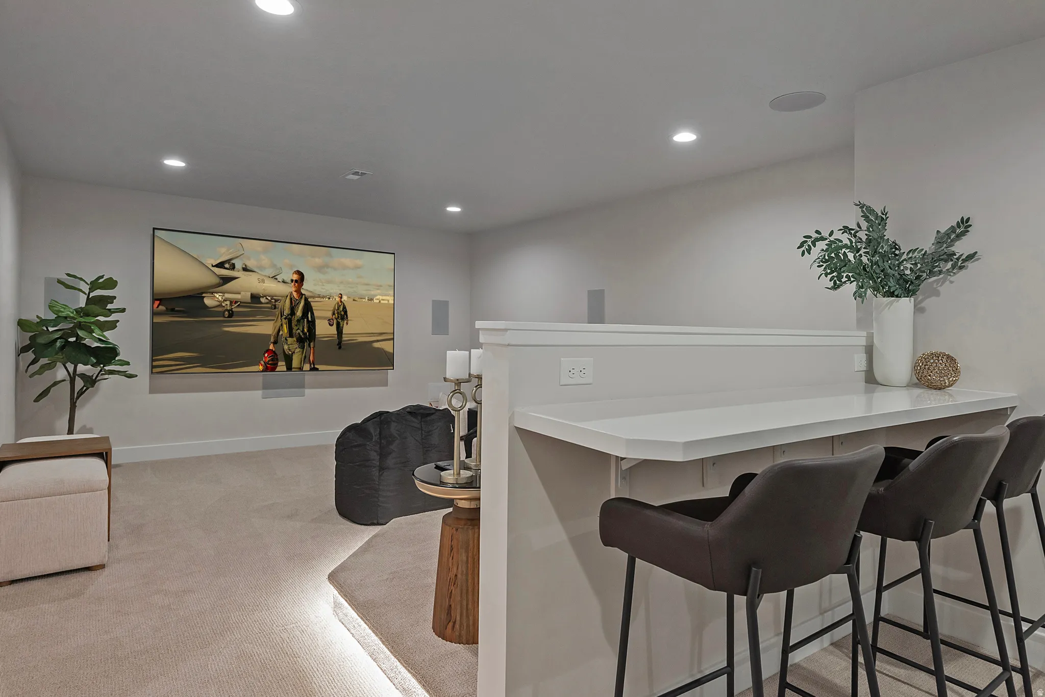 Bar featuring light carpet, recessed lighting, and light countertops