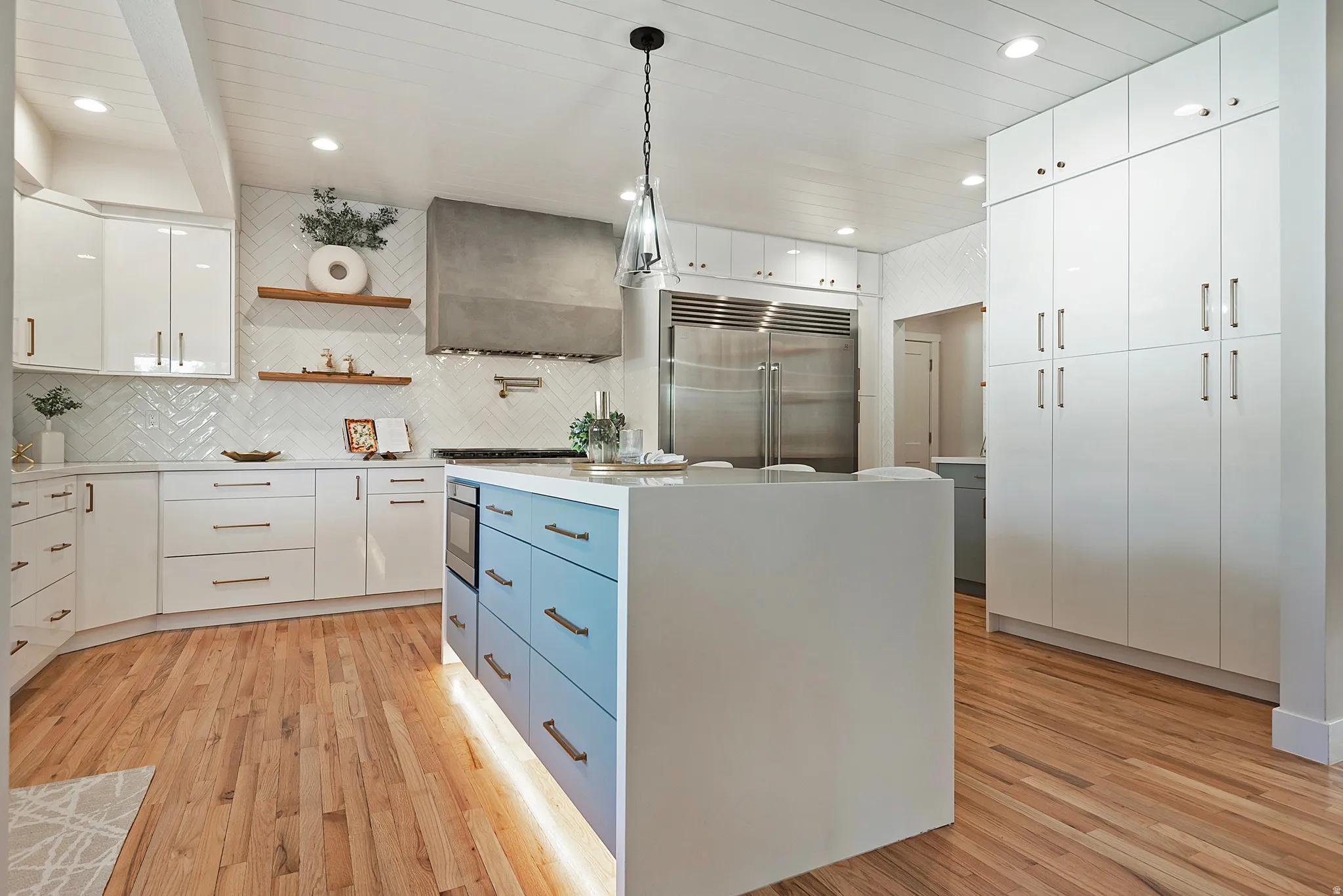 Dual tone kitchen with stainless steel upgraded appliances, open shelving and tons of cabinetry - all new!