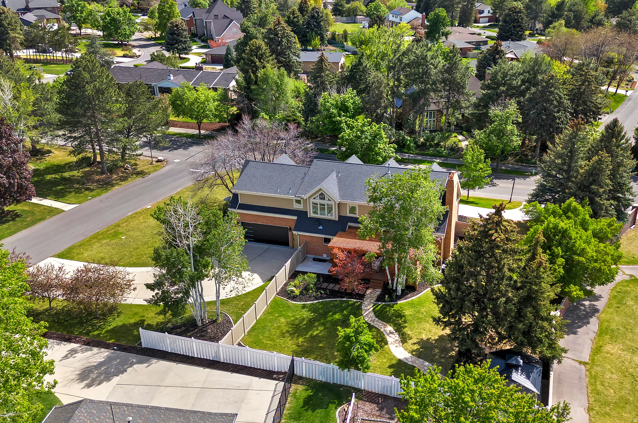 Aerial view of property and private backyard.  Plenty of room to add a second garage.