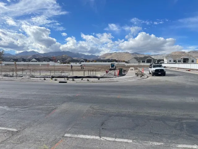 Expansive building lot with visible mountain backdrop