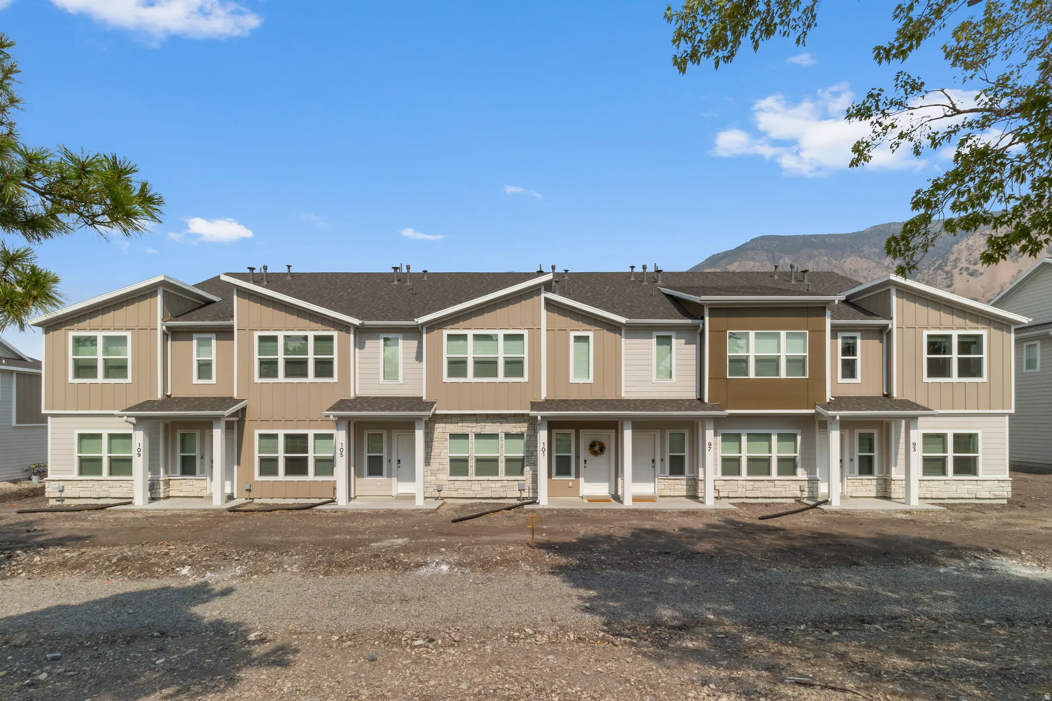 Modern multi-unit dwelling with a combination of vertical and horizontal siding