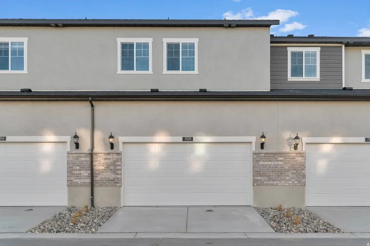 Contemporary multi-story exterior featuring stucco and horizontal siding finishes
