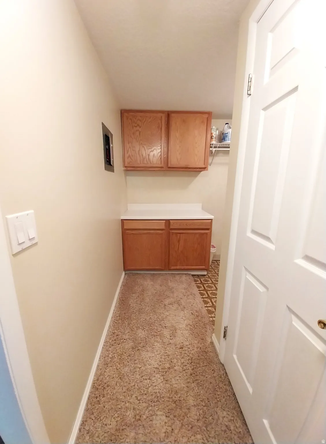Hall featuring baseboards