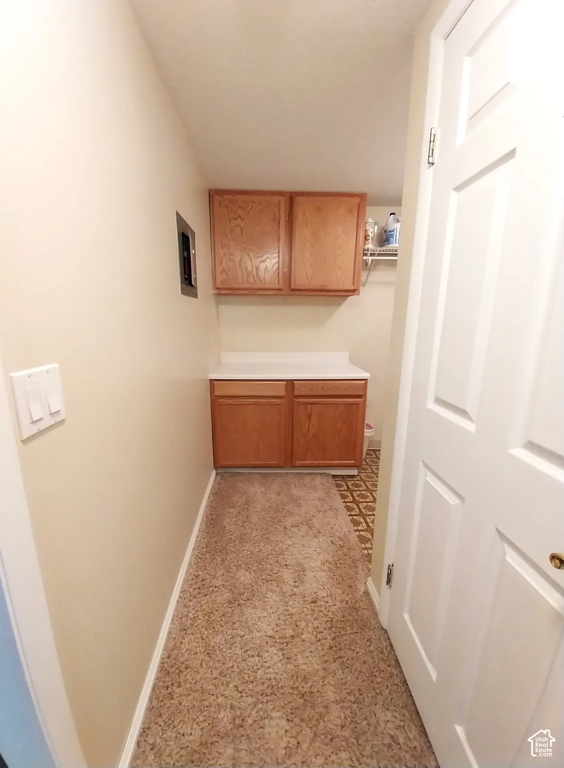 Hall featuring baseboards