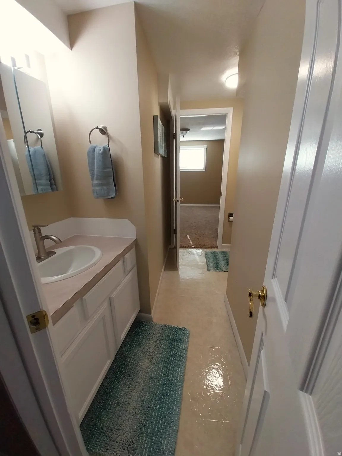 Three quarter bath with vanity and shower stall