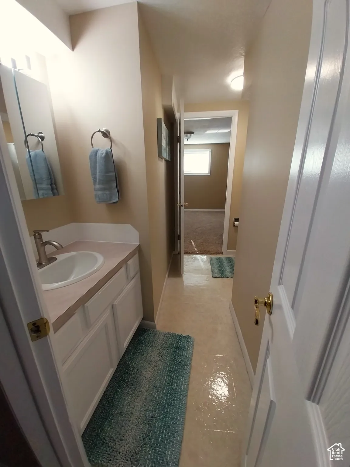 Three quarter bath with vanity and shower stall