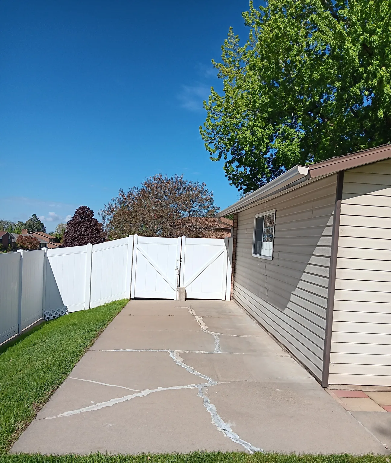 View of RV parking with a gate