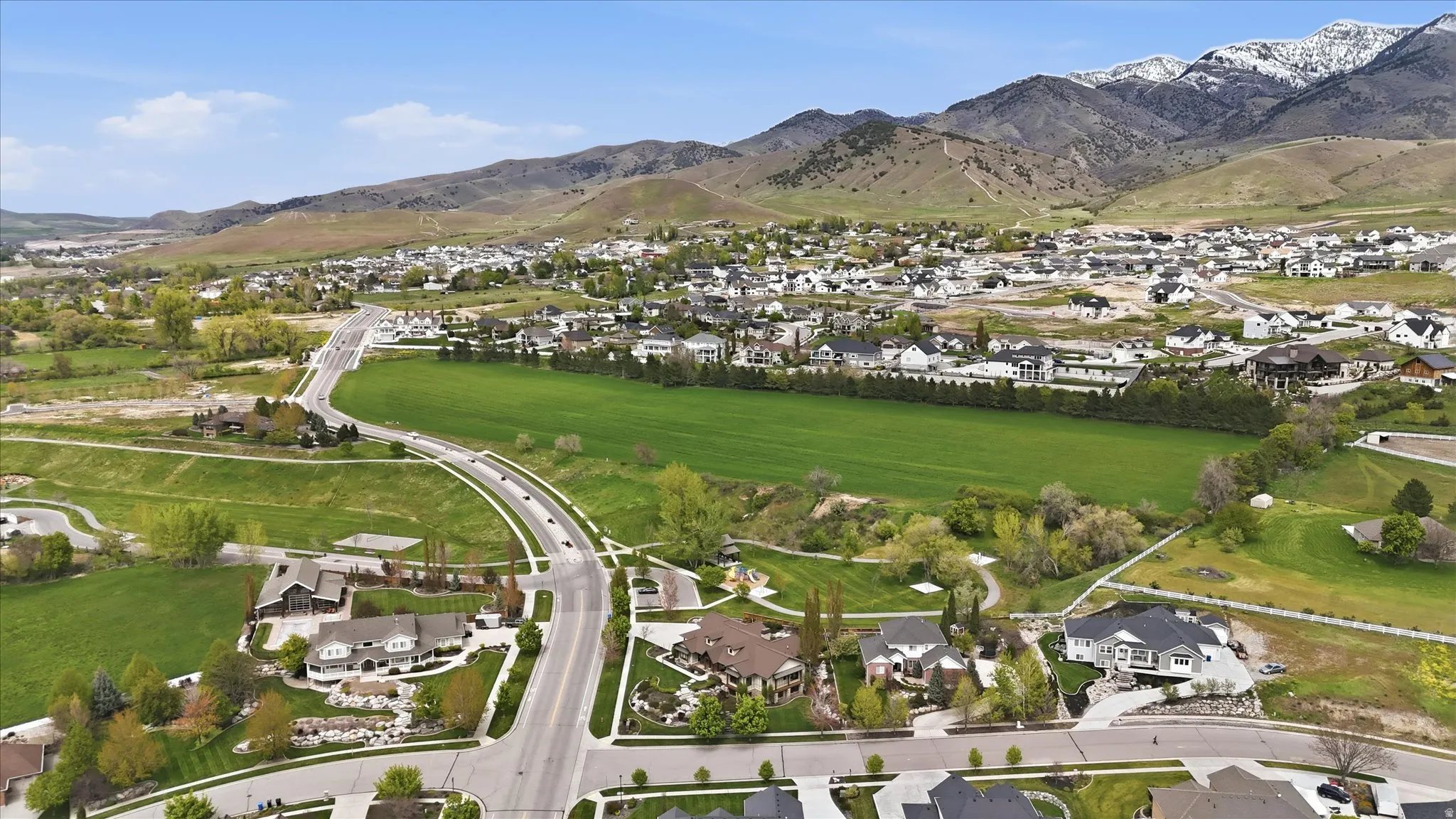 Expansive aerial perspective showcasing a residential development with varied architectural styles