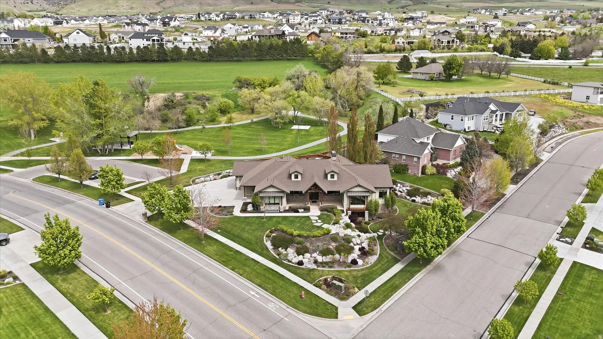 Spacious single-story residence with an attached garage and a multi-gabled roofline