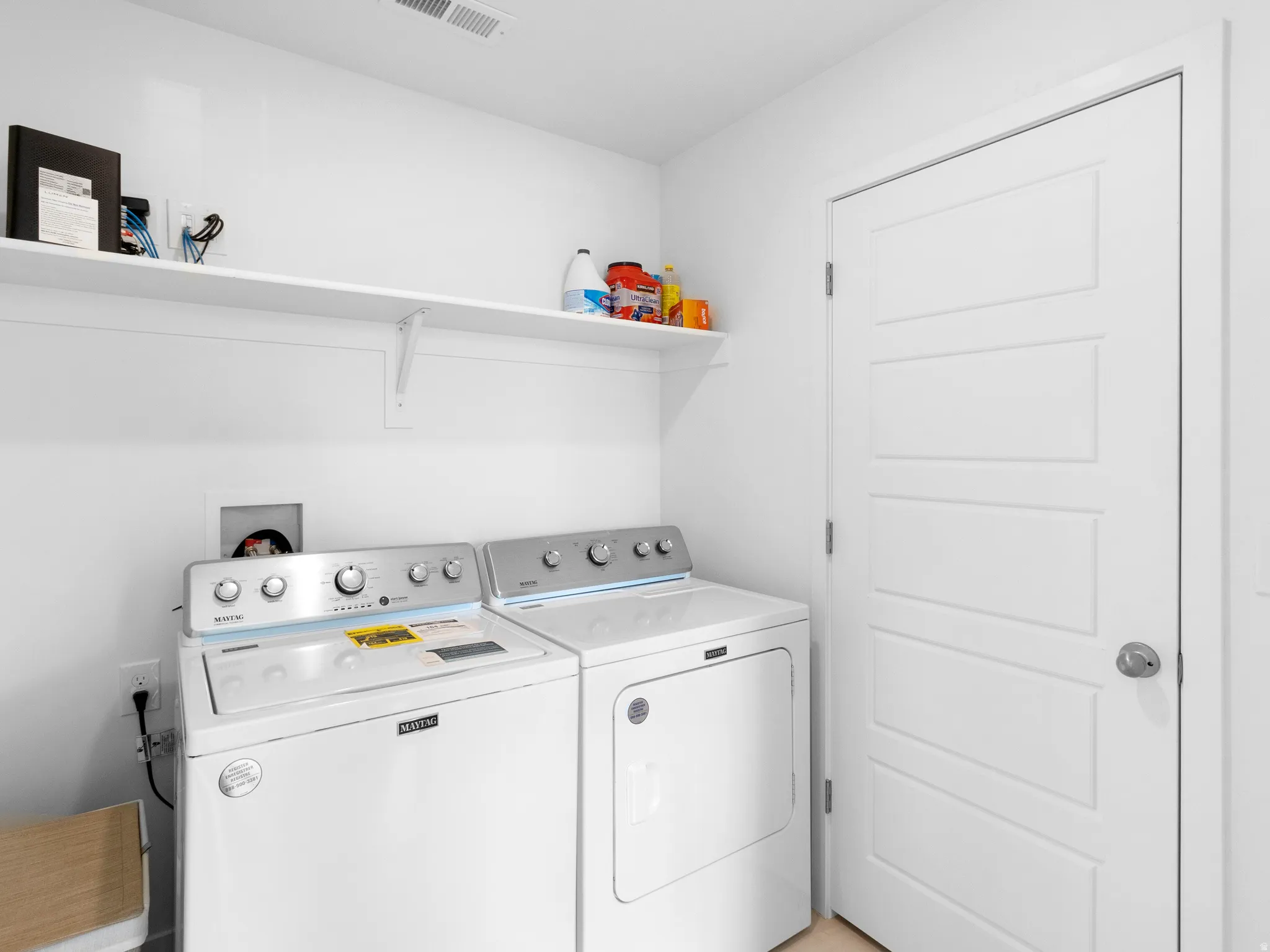 Laundry area with washing machine and dryer