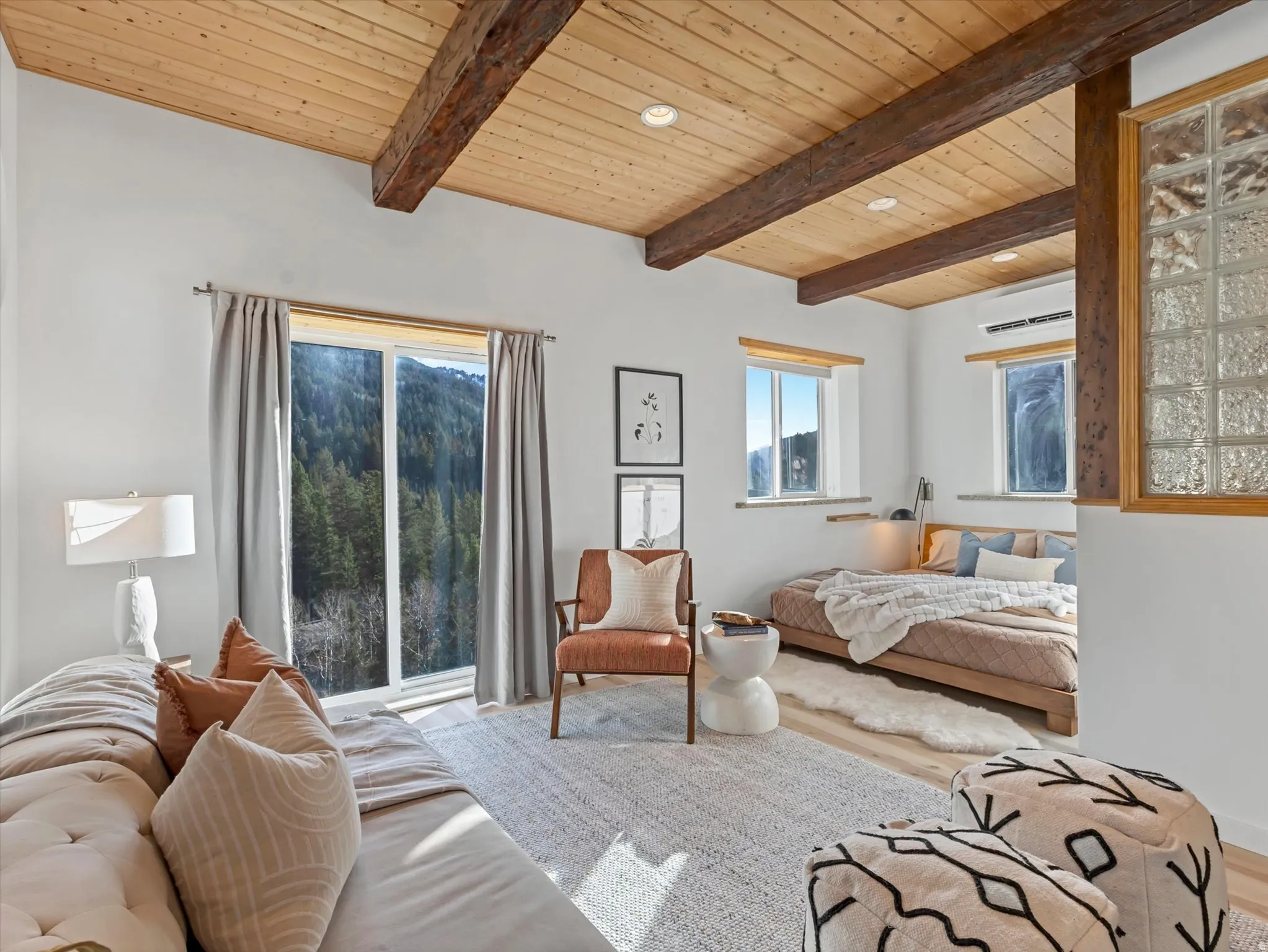 Bedroom with a wood ceiling with exposed beams, recessed lighting, and wood finished floors