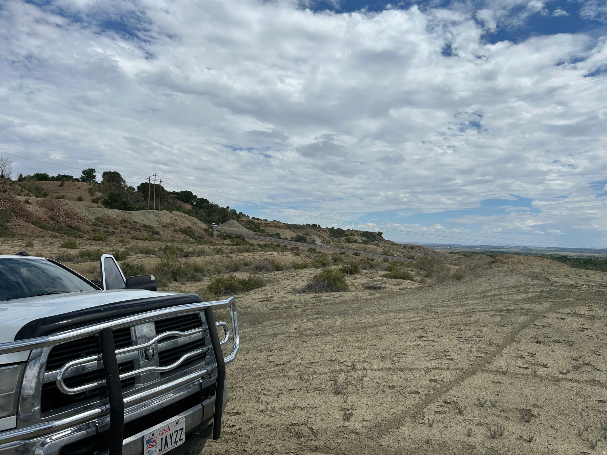 Expansive undeveloped terrain featuring varied topography and distant horizons