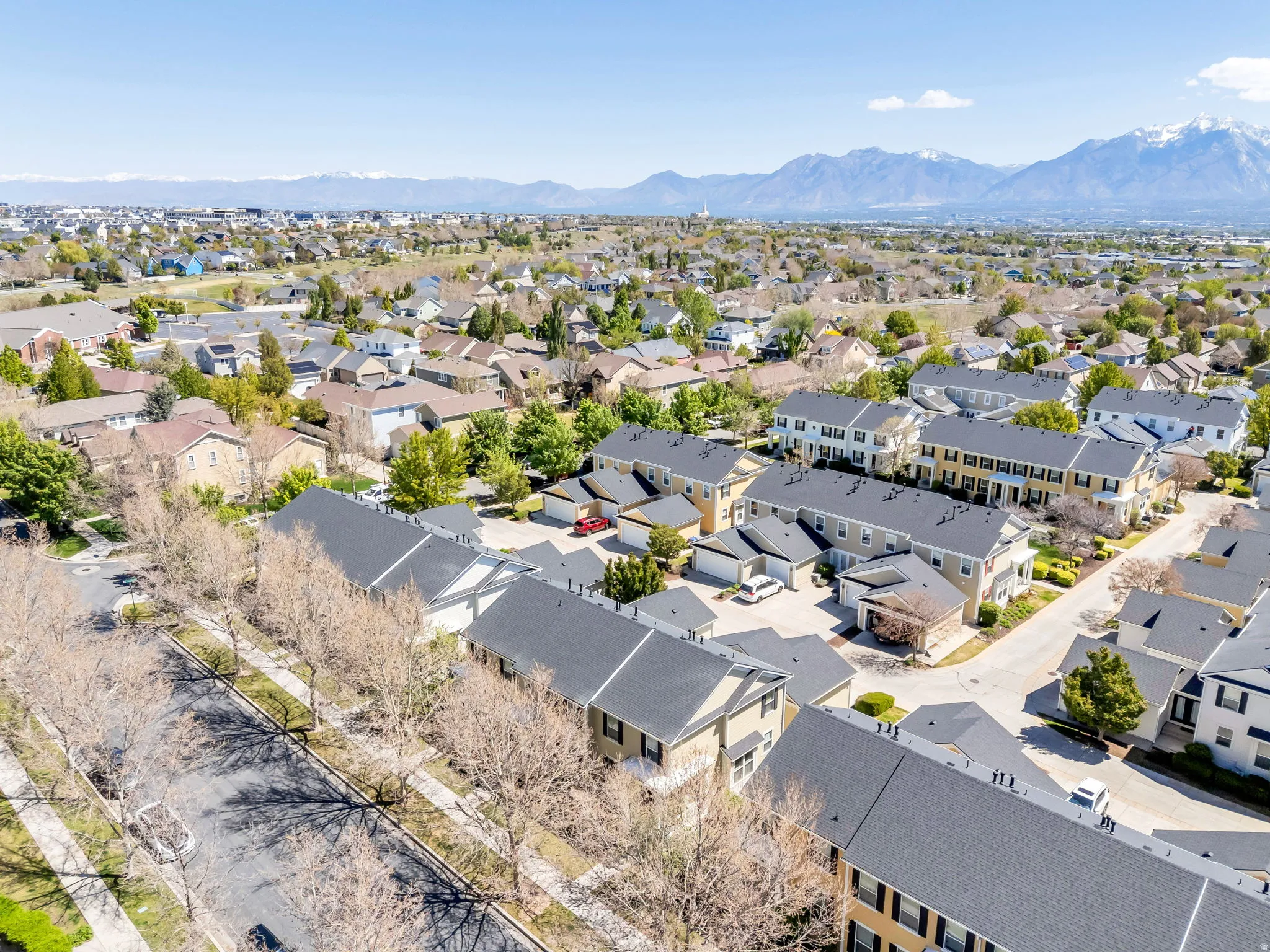 Aerial view of residential area featuring mountains