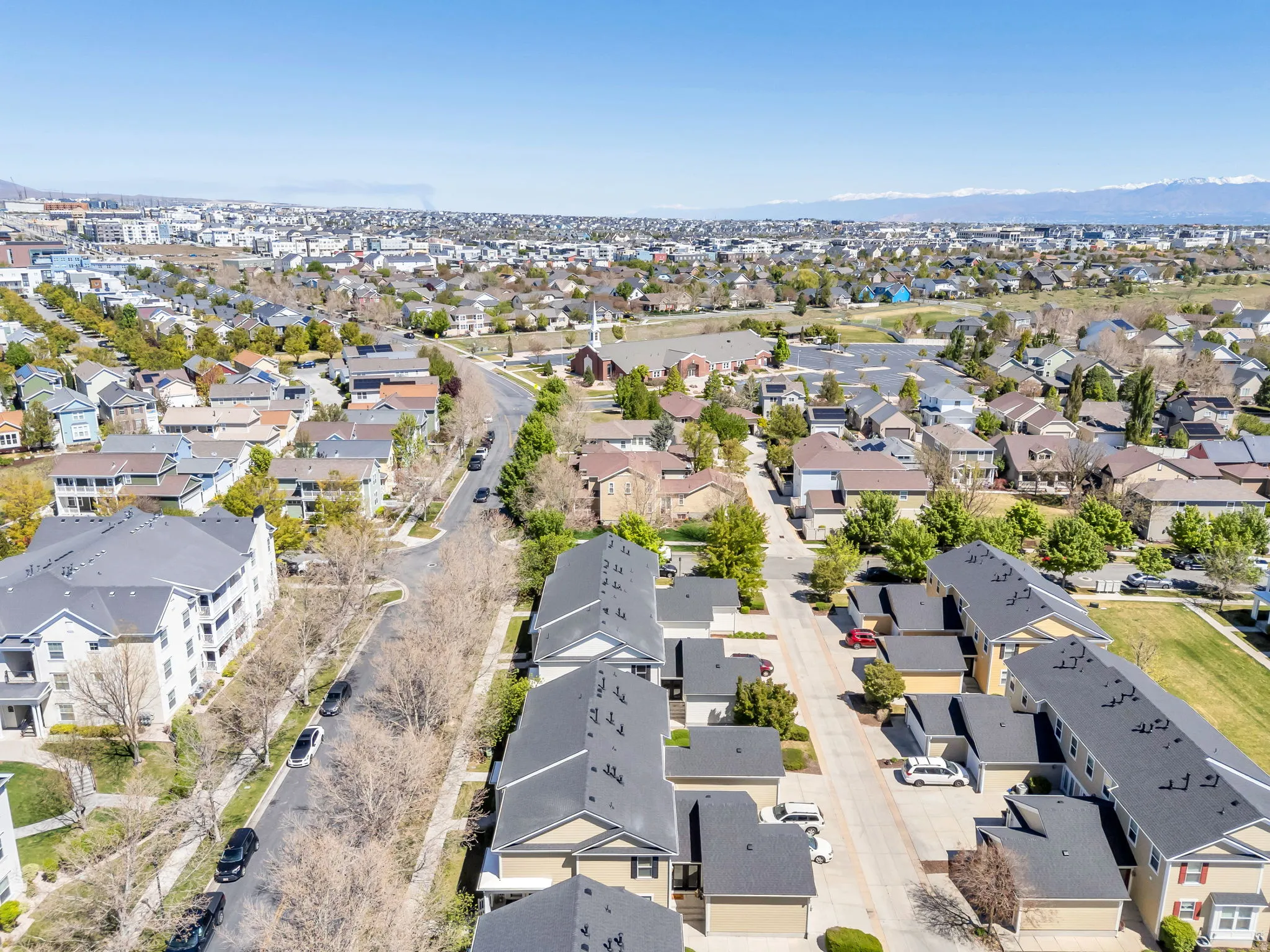 Aerial overview of property's location featuring nearby suburban area
