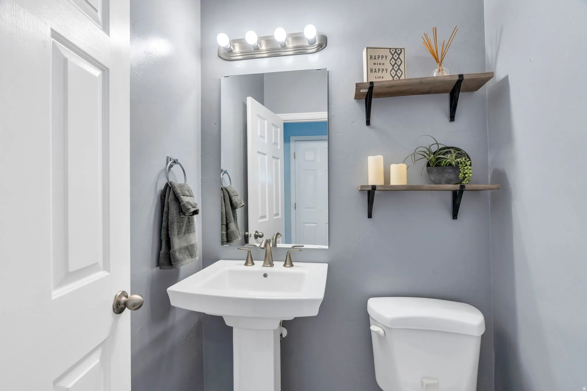 Bathroom featuring toilet and a sink
