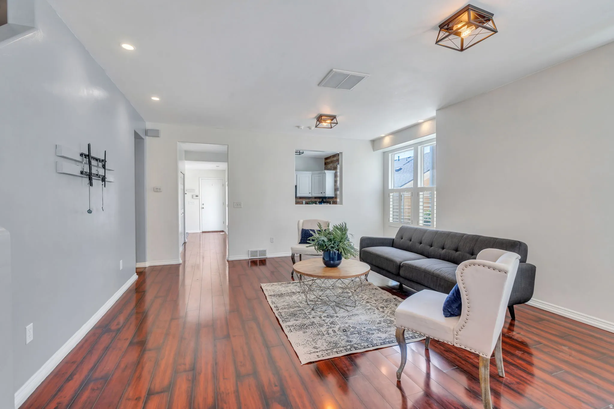 Living room featuring dark wood finished floors