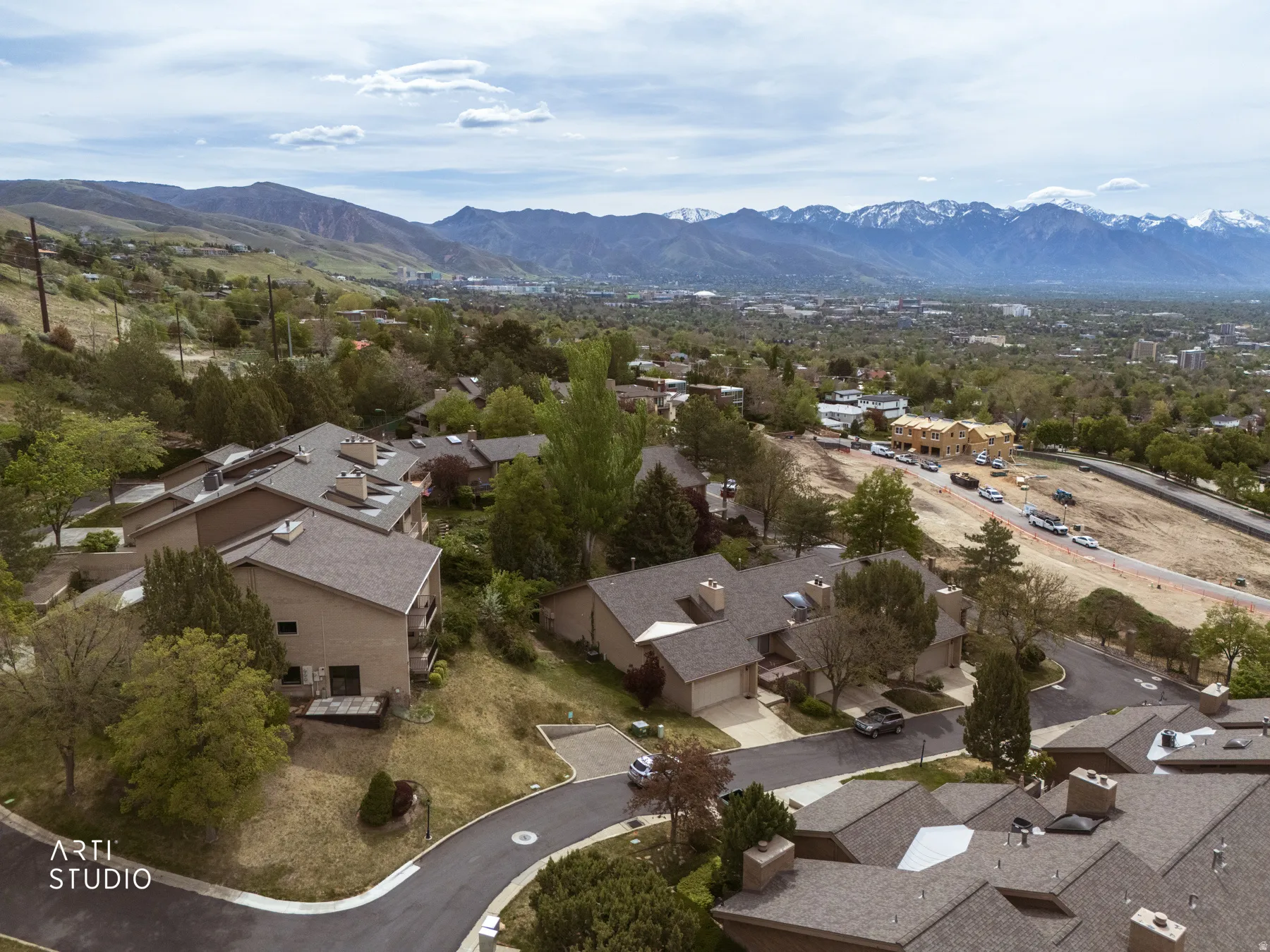 Aerial perspective showcasing location above valley and mountain views