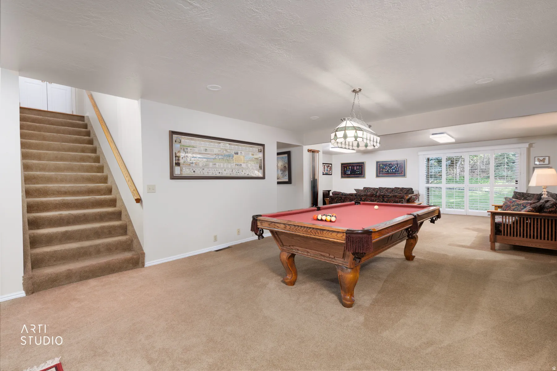 Spacious recreation room featuring a pool table, wall-to-wall carpeting, and recessed lighting