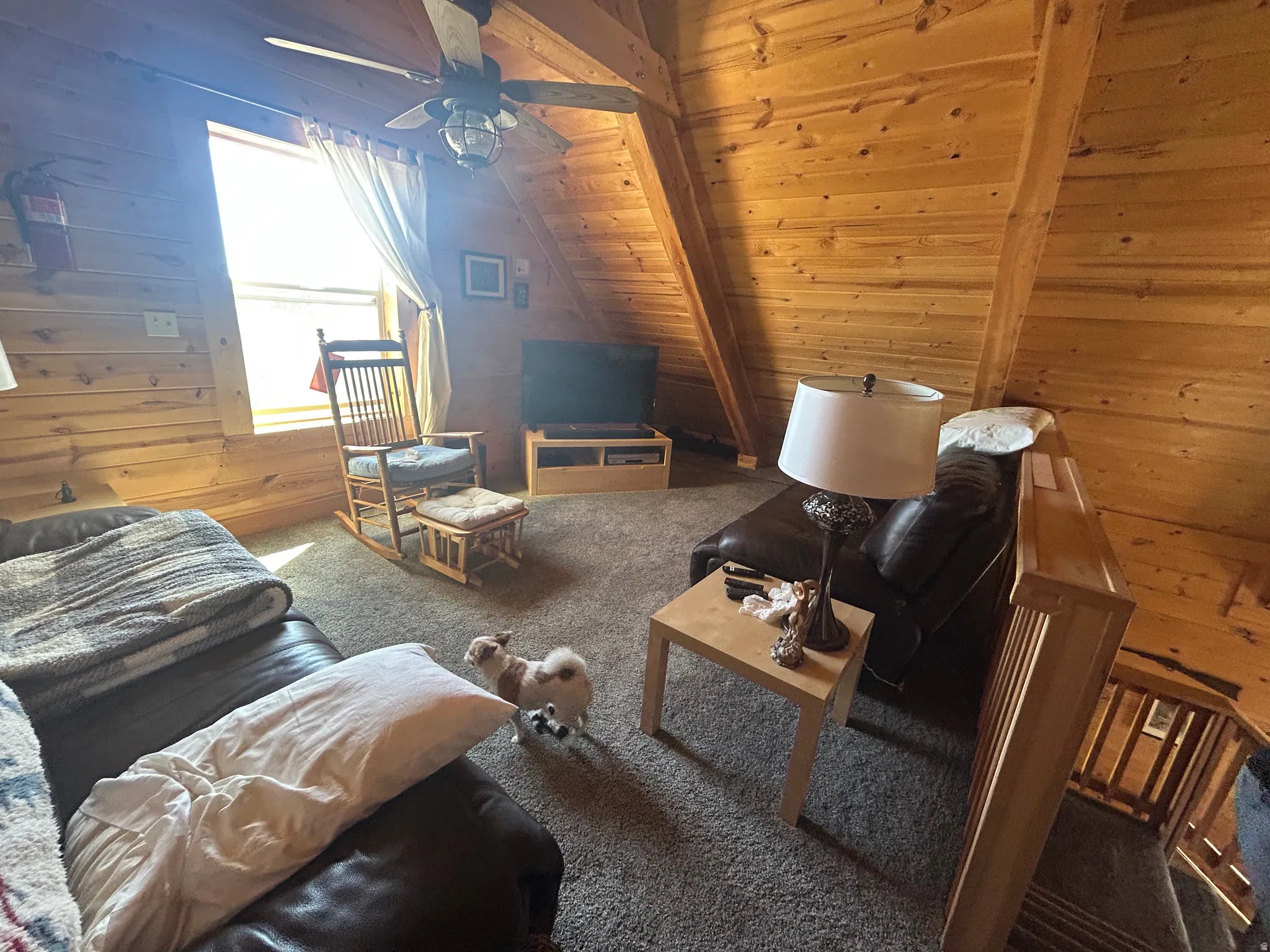 Vaulted ceiling with wood paneling