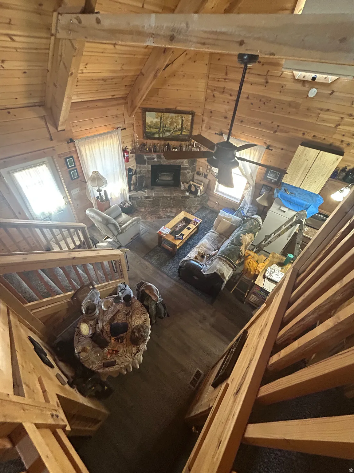 Vaulted wood-paneled ceilings with exposed beams