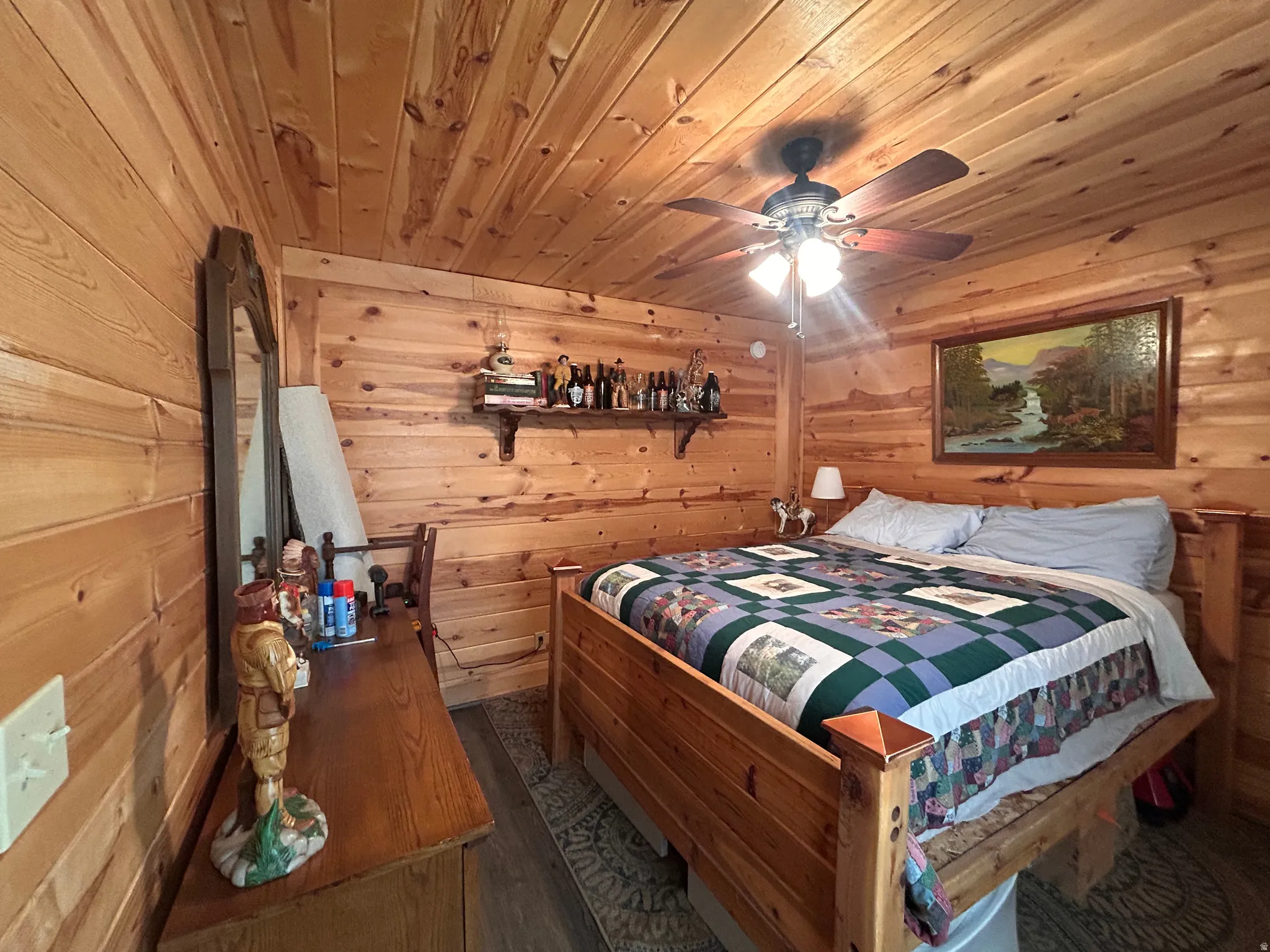 Room featuring extensive wood-paneled walls and a matching wood-paneled ceiling