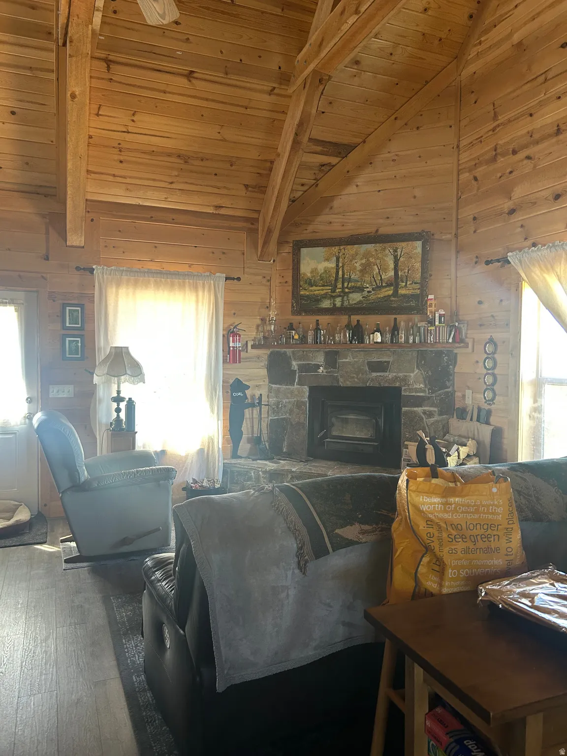 Vaulted wood-paneled ceiling with exposed beams