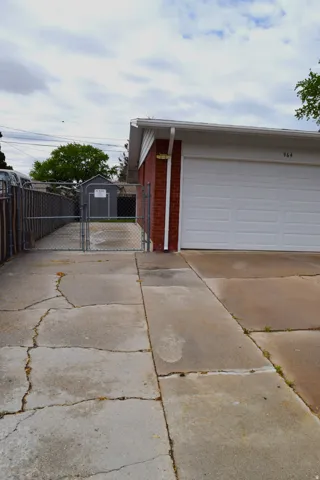 RV parking on side of garage