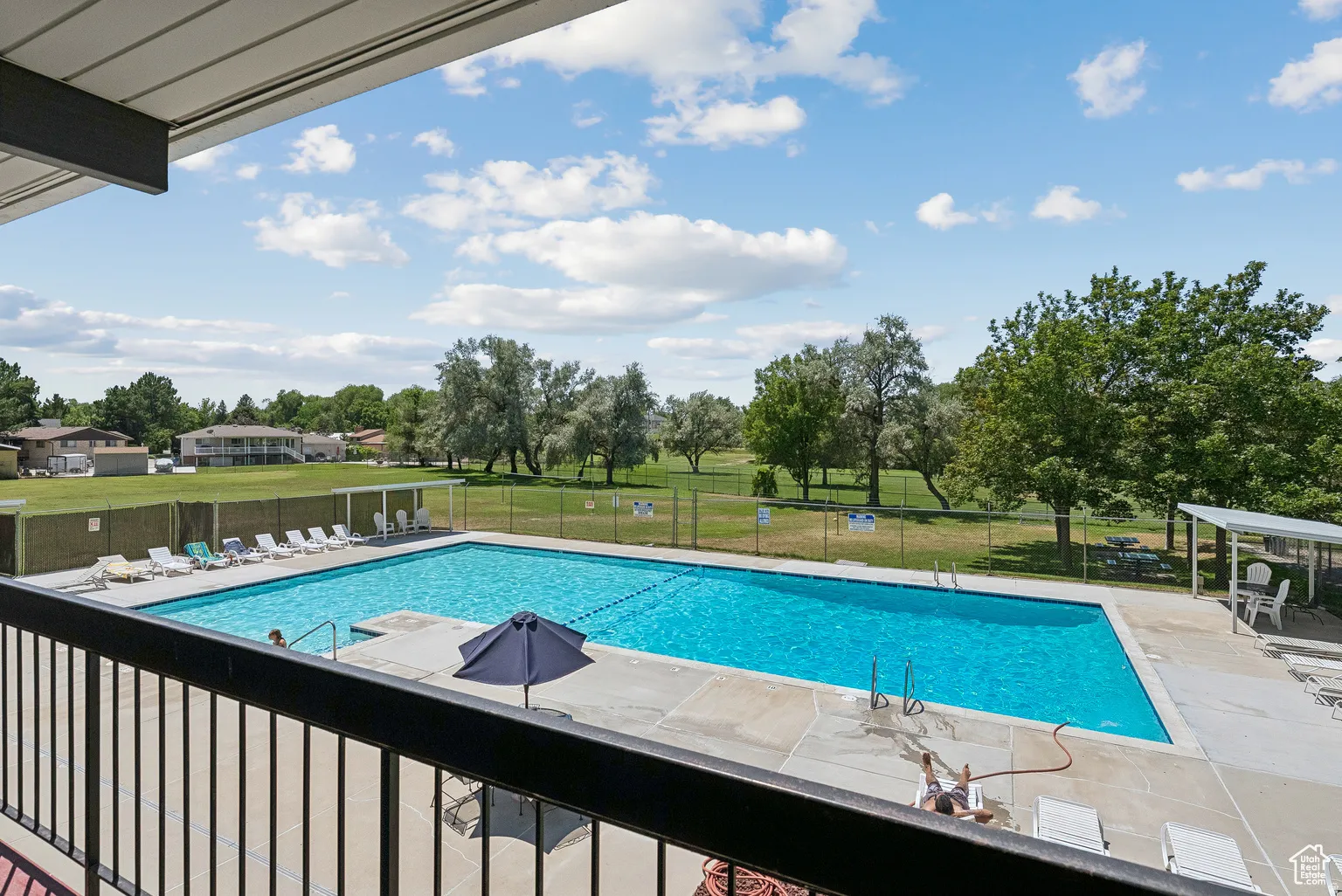 Rectangular swimming pool with a surrounding concrete deck
