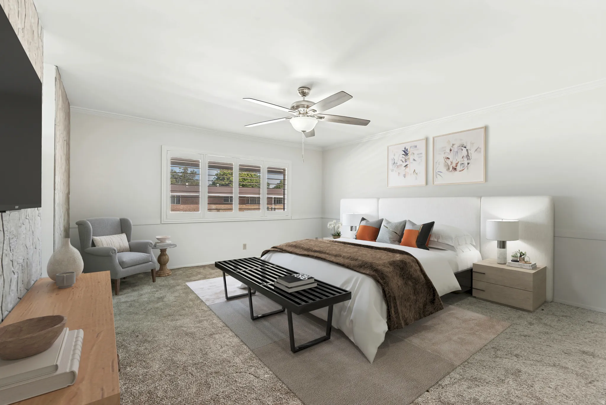 Spacious bedroom featuring a ceiling fan, a large window, a textured accent wall, and light-toned carpeting