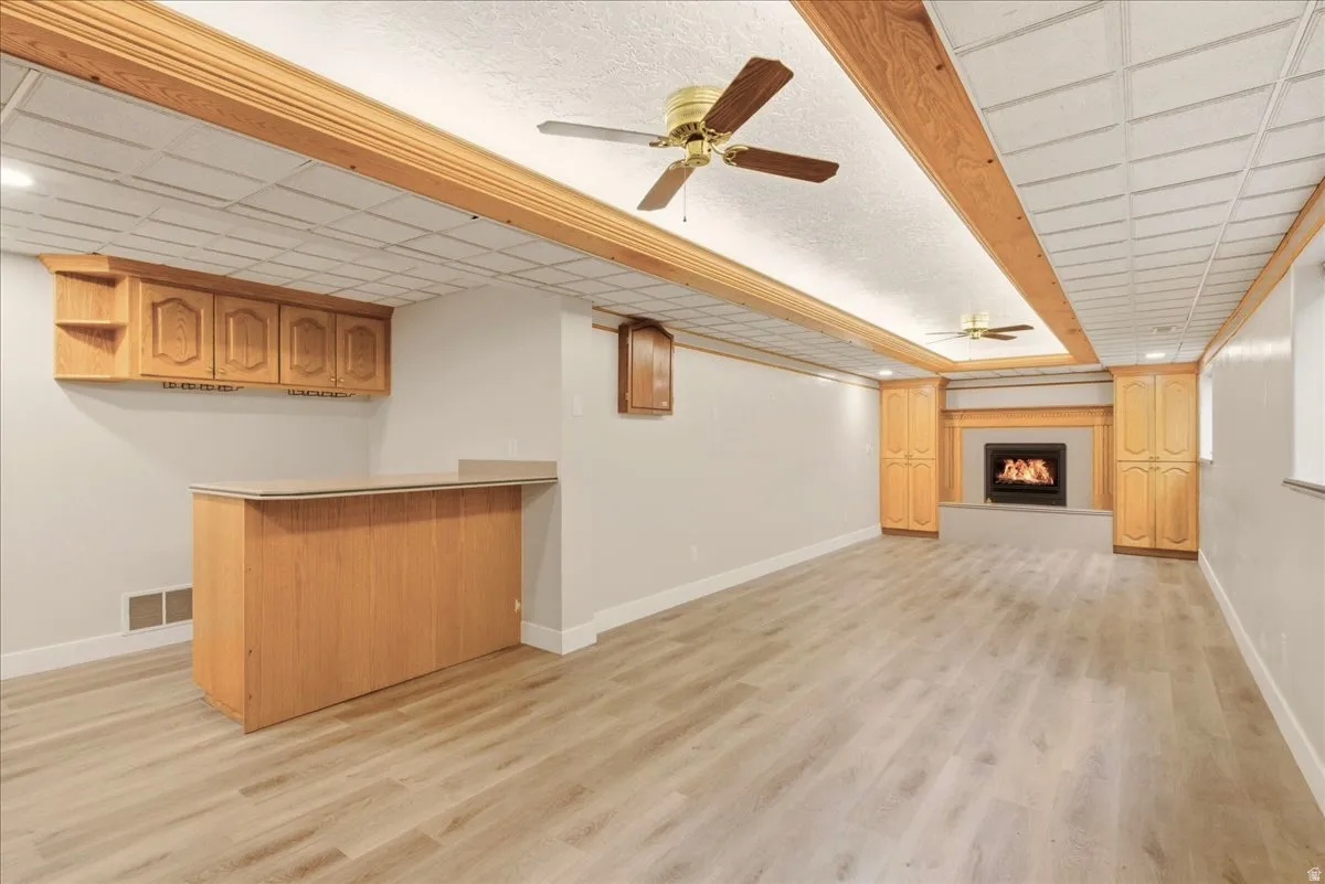 Spacious basement living room and dry bar area