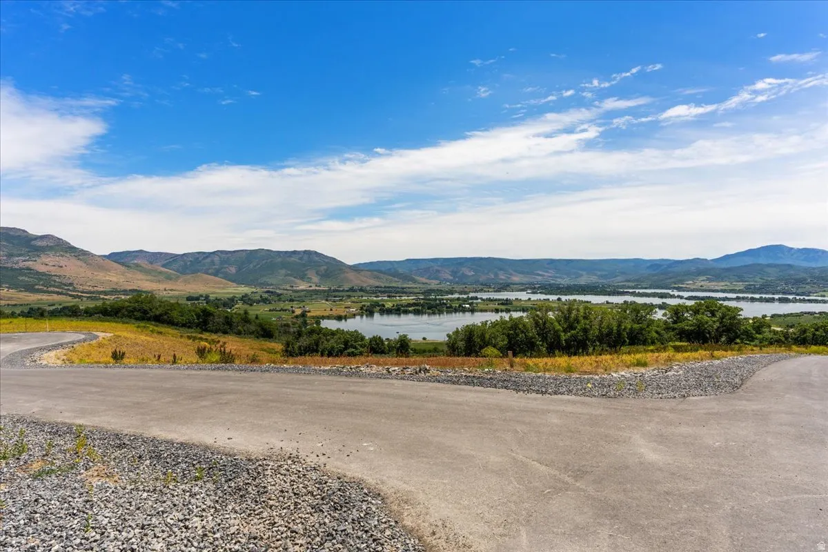 View of mountain backdrop with a nearby body of water