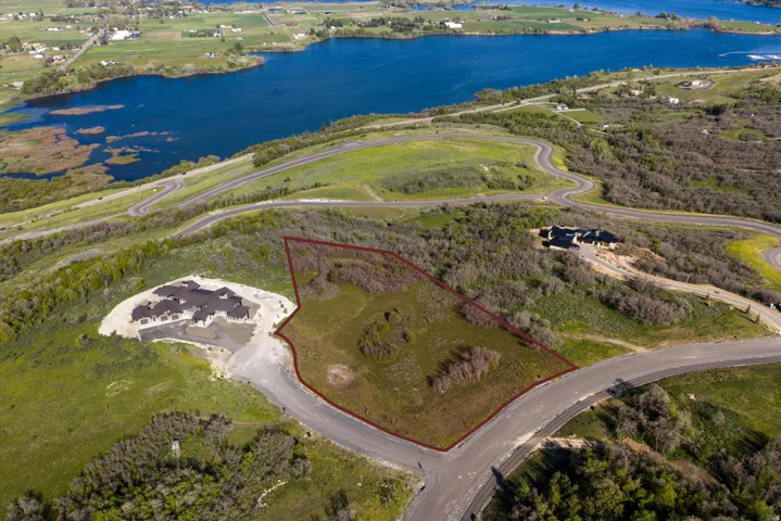 Expansive lot featuring a natural landscape and surrounding foliage