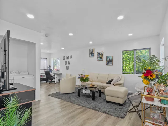 Light wood-finish flooring throughout the main living area