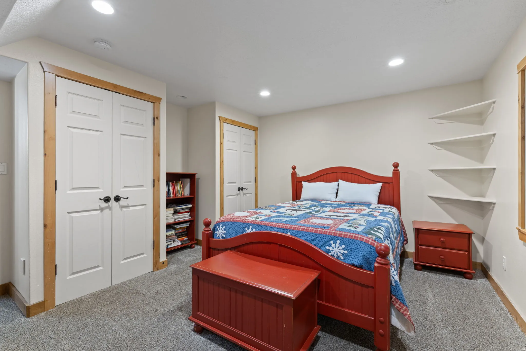 Basement bedroom with neutral wall paint providing a versatile backdrop