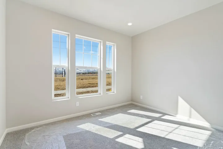 Triple pane windows showcasing mountain scenery