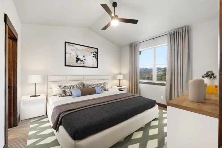 Vaulted ceiling featuring a ceiling fan with integrated lighting