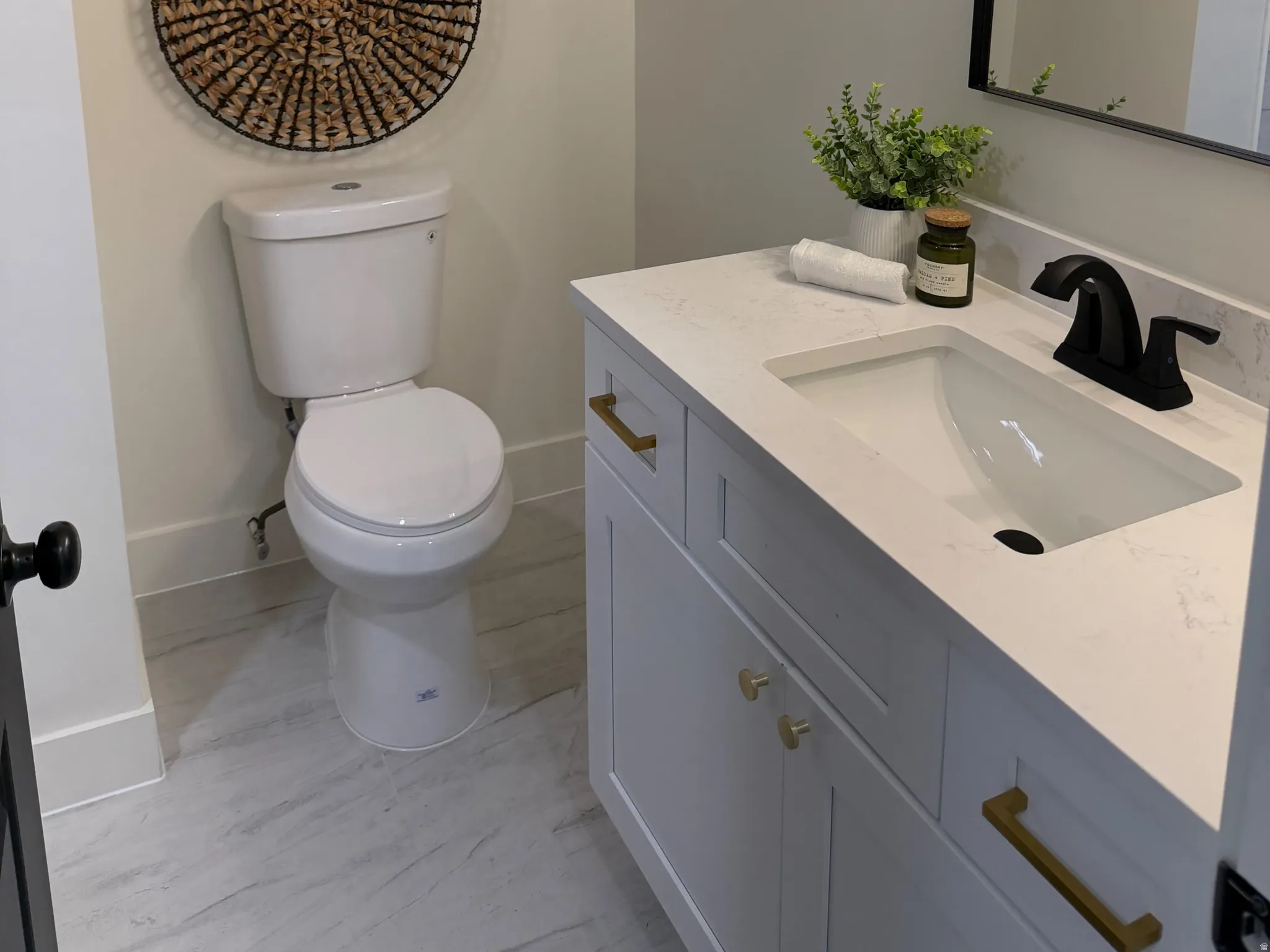 Bathroom with vanity and a textured ceiling