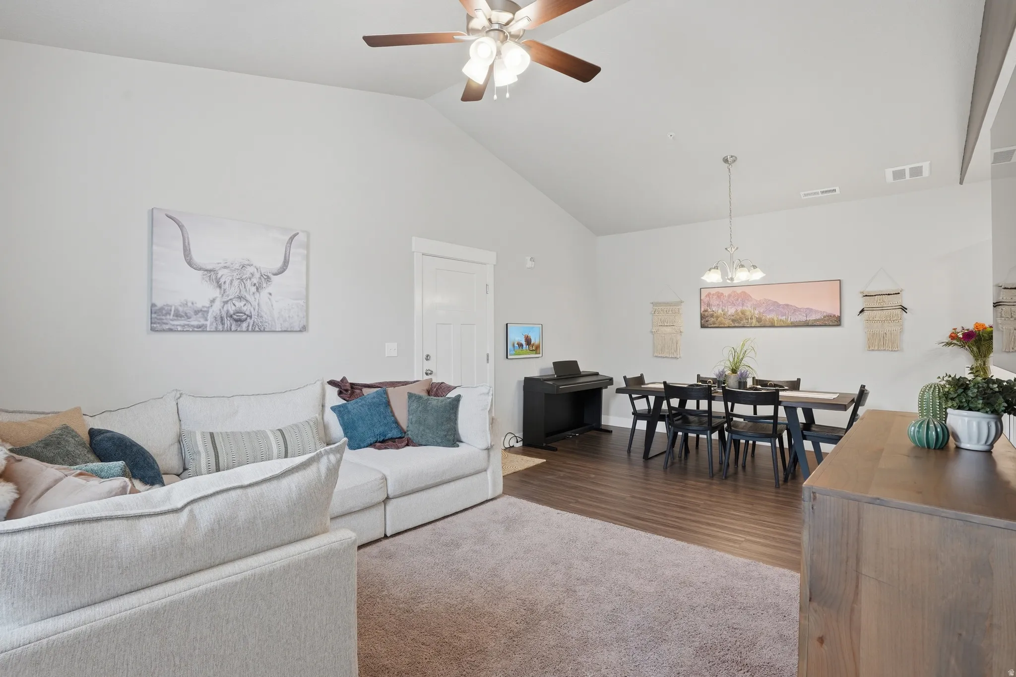 Vaulted ceilings enhance this open-concept living area