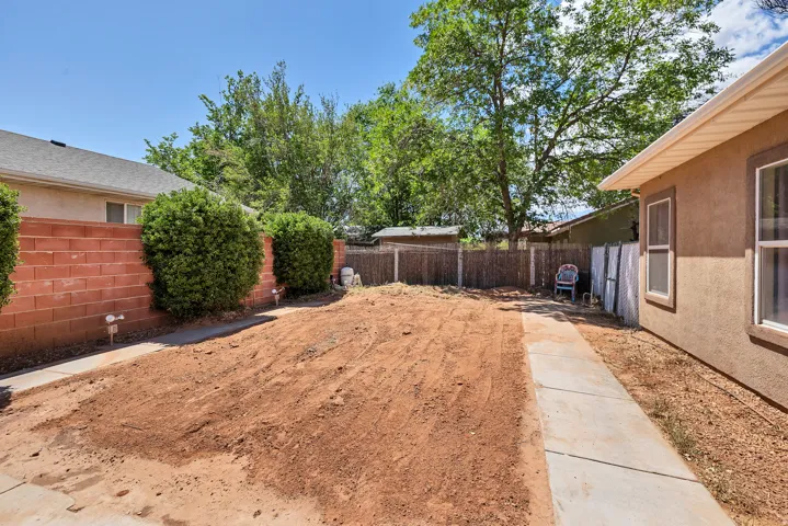 View of fenced backyard