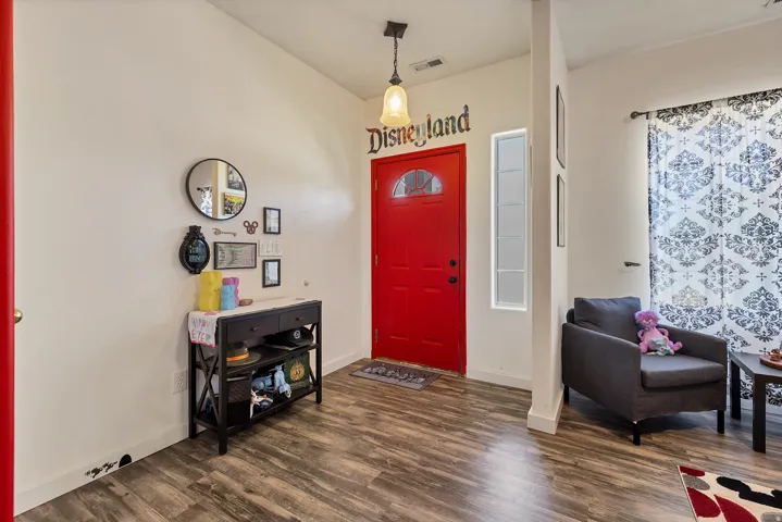 Entrance foyer featuring dark wood finished floors