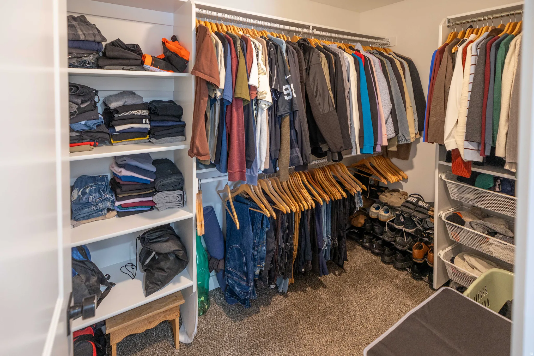 Walk-in closet with carpet