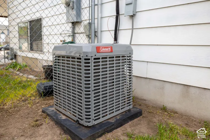 Exterior view of a cooling unit and electric meter