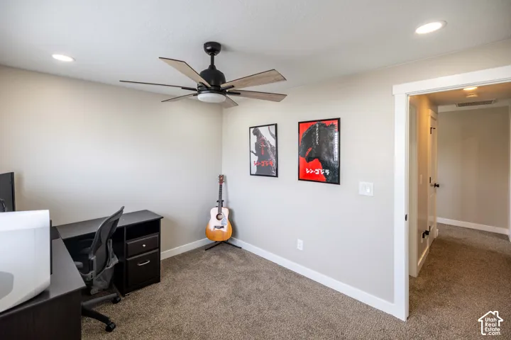 Bedroom with recessed lighting and a ceiling fan