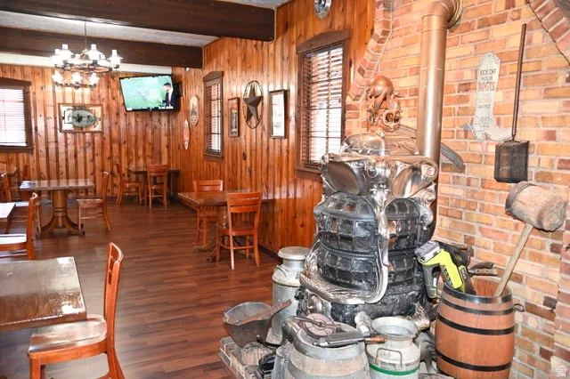 Warm interior space featuring extensive wood paneling