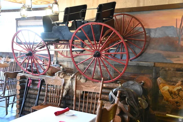 Decorative wagon wheel feature with red-painted spokes