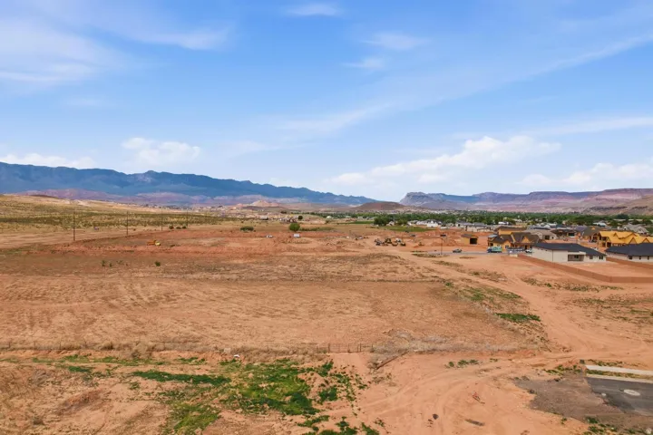 Expansive undeveloped land featuring a cleared lot, ready for construction
