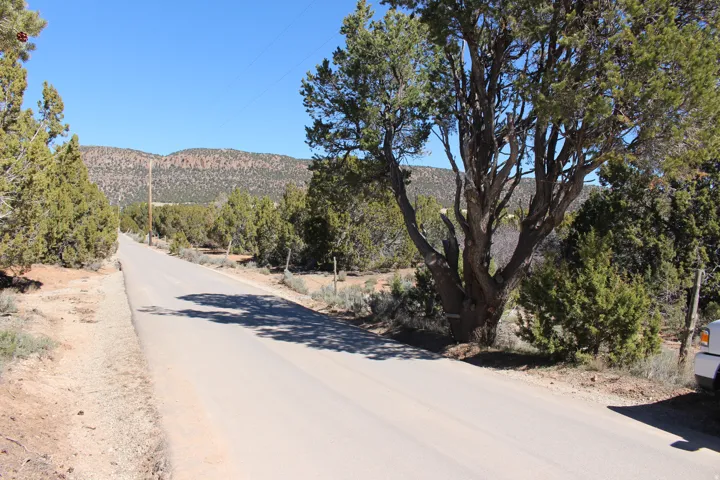 Paved road offering access to a rugged, natural landscape
