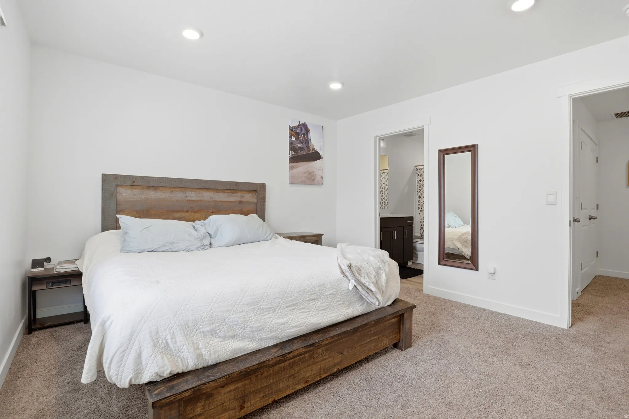 Carpeted bedroom featuring recessed lighting and white walls