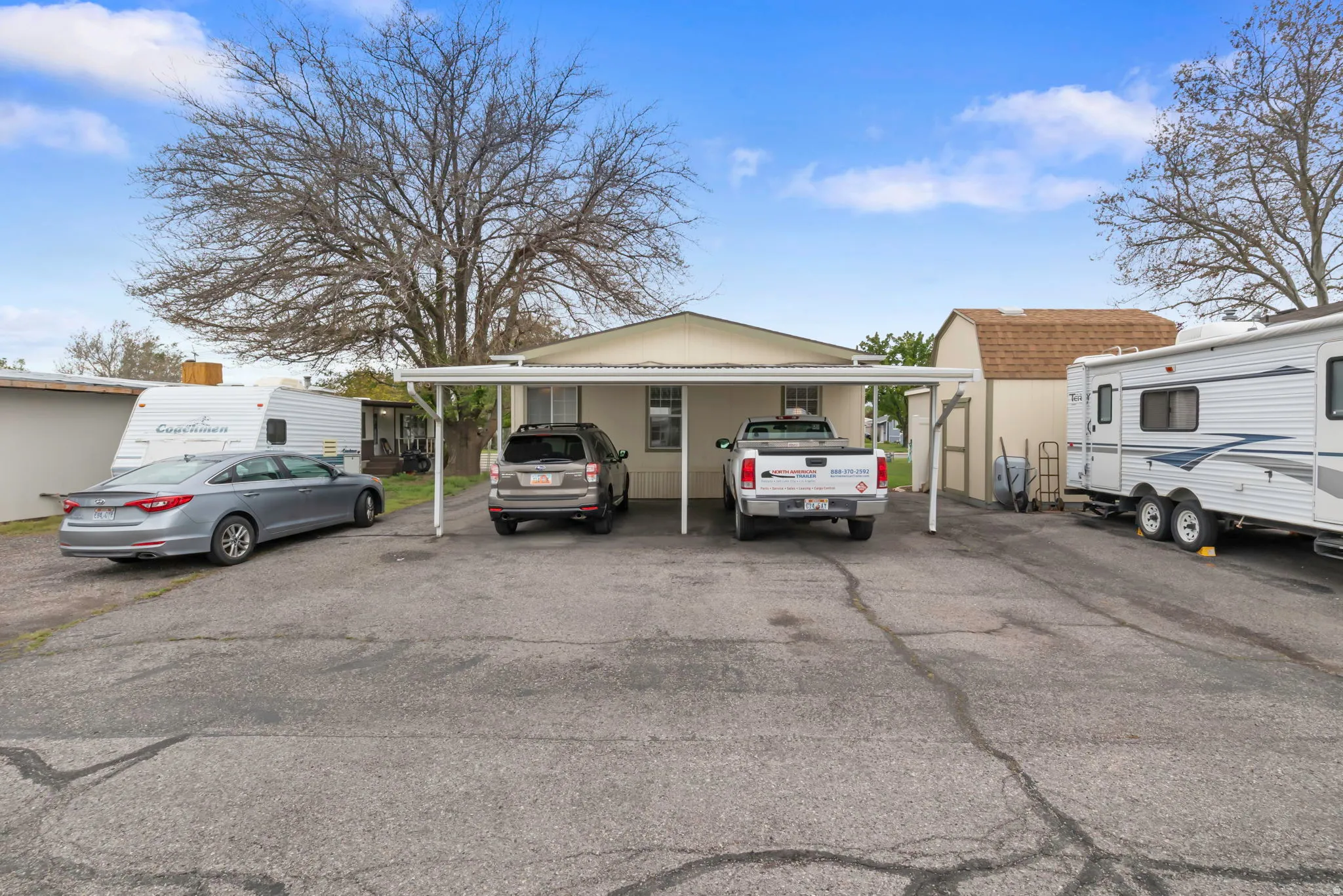 Single-story exterior with a covered carport