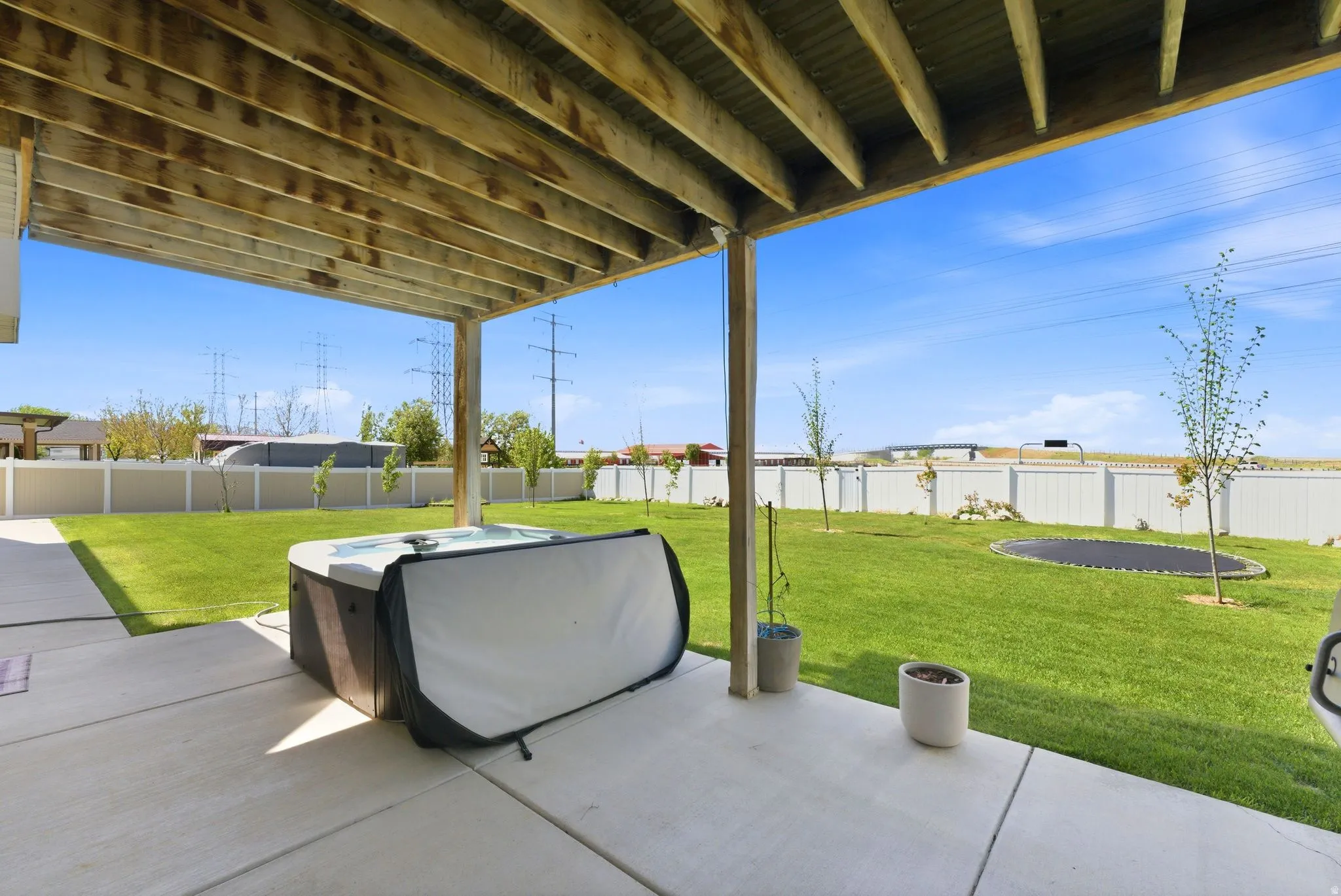 Fenced backyard featuring a patio area